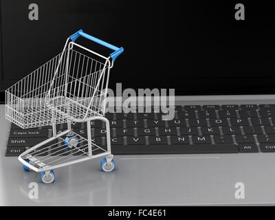 3D Warenkorb auf Laptop. e-Commerce Konzept Stockfoto