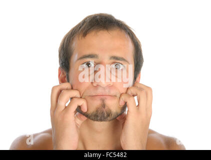 überrascht Man Kratzer Gesicht Stockfoto