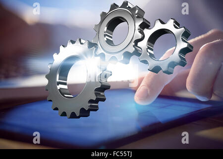Zusammengesetztes Bild aus Metall Zahnräder und Räder verbinden Stockfoto