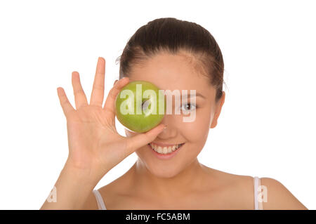 lächelnde asiatische Frau mit grünem Apfel Stockfoto