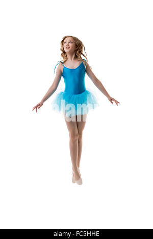 Entzückende kleine Ballerina posiert in Bewegung Stockfoto