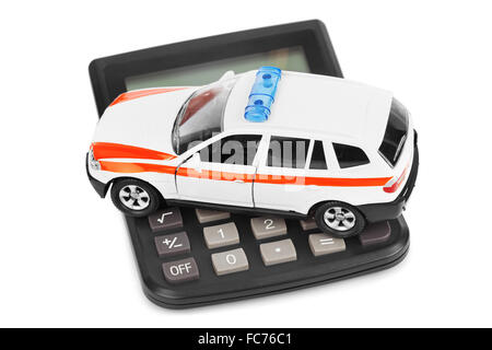 Rechner und Spielzeug Polizeiauto Stockfoto