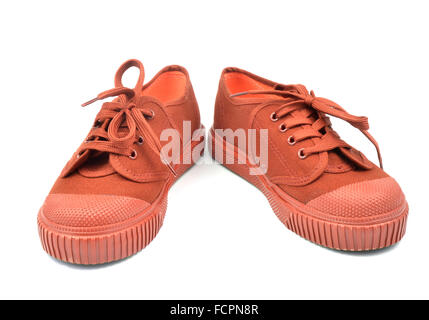 braune Turnschuhe isoliert auf weißem baackground Stockfoto