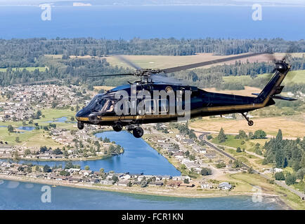 US-Zoll und Grenze Schutz CBP Büro für Luft- und Marine-Einheit ein Sikorsky UH-60 Blackhawk Hubschrauber bietet bewaffnete Antwort und Sicherheit an der Nordgrenze der US-Bundesstaat Washington mit Kanada. Siehe Beschreibung für mehr Informationen. Stockfoto