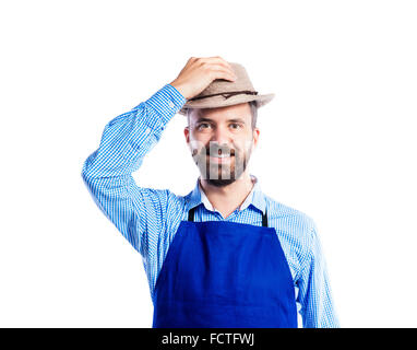 Junge hübsche Gärtner Stockfoto