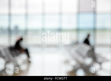 Passagiere in der Flughafen-Lounge - defokussierten erlauben Hintergrund Stockfoto