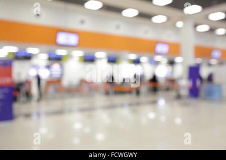 Der Check-in Schalter im Flughafen - defokussierten Hintergrund Bokeh Stockfoto