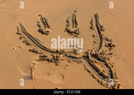 Sand Zeichnungen am Strand Stockfoto