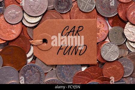 Auto-Fonds-Label auf britische gemischte Münzen Stockfoto