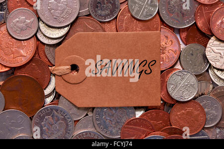 Einsparungen-Label auf britische gemischte Münzen Stockfoto