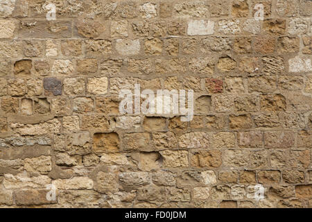 Mittelalterliche Steinmauer in Córdoba, Andalusien, Spanien. Hintergrundtextur. Stockfoto