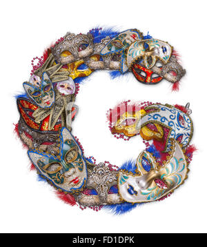 Buchstabe G gemacht Karnevalsmaske und Feder Stockfoto