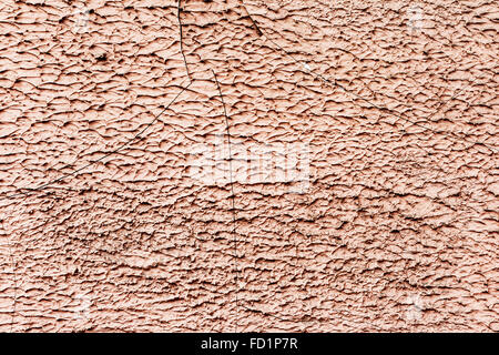 Abstrakter Hintergrund konkrete verwitterte lackiert rosa Farbe, Risse und Kratzer. Landschaftsstil. Grunge Betonoberfläche. Stockfoto