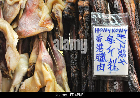 Erhalten Fleisch hängen an einem Marktstand in Hong Kong Stockfoto