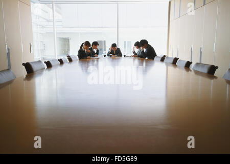 Geschäftsleute, die mit einem Treffen Stockfoto