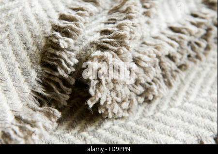 Fringed Rand der Wolldecke Fringed Rand der Wolldecke Stockfoto