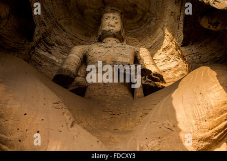 Alte Stein Buddha-Statue im Yungang Grotten, Datong, Provinz Shanxi, China Stockfoto