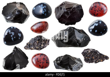 natürliche mineralische Edelsteine - Set verschiedene Obsidian (schwarz, vulkanisches Glas, Schneeflocke, Mahagoni) Juwel Steinen und Felsen isoliert o Stockfoto