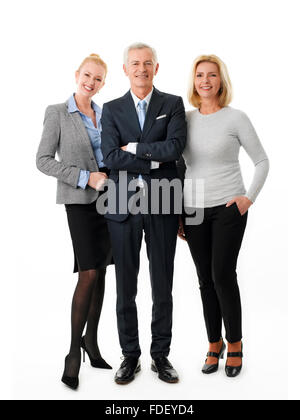 Erfolgreiches Team vor weißem Hintergrund stehen. Stockfoto