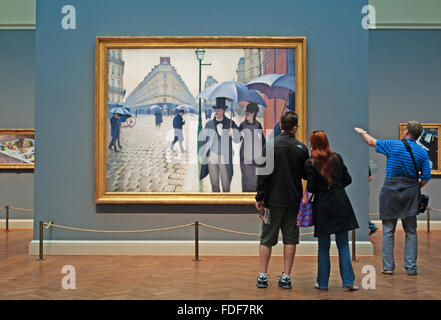 Chicago, Illinois, USA: ein Blick auf das Öl Malerei Paris Street regnerischen Tag vom Künstler Gustave Caillebotte in einer Halle der Kunst Institut von Chicago Stockfoto