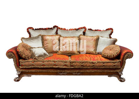 schönes Sofa mit Kissen auf einem weißen Hintergrund Stockfoto