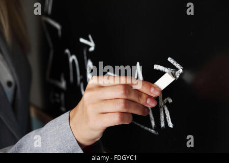 Lehrer zeichnen Zustand des Synchronismus phase Stockfoto