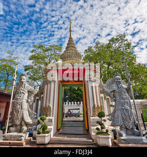 Chinesische Stein Puppen, des Tempels Tor Wächter. Tempel Wat Pho, Bangkok, Thailand. Stockfoto