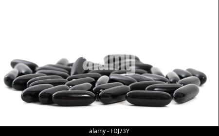 Pharmazeutischen schwarze Pillen oder Drogen auf weißem Hintergrund Stockfoto