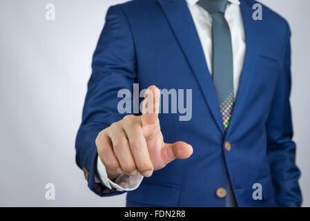 Geschäftsmann Index Zeigefinger, Aktion des Touchscreens Stockfoto