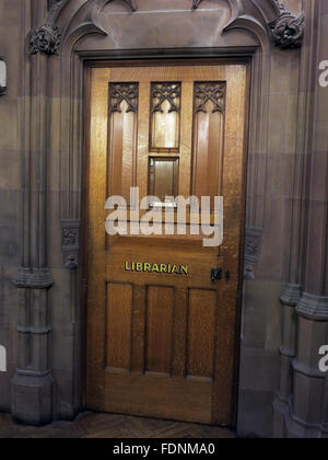 John Rylands Library Interieur, Deansgate, Manchester, England, UK - Bibliothekar-Tür Stockfoto