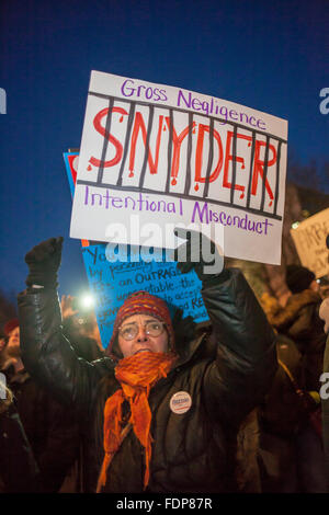 Lansing, Michigan - Demonstranten fordern Michigan Gouverneur über Flint Wasserkrise zurücktreten. Stockfoto