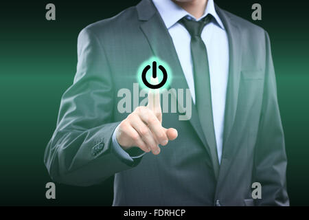Geschäftsmann Konzept der Power-Taste drücken Stockfoto