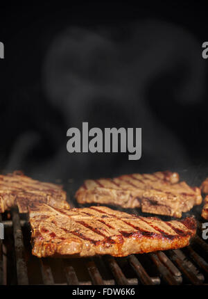 Amerikanisches Steak BBQ schwarzen Hintergrund mit Textfreiraum Stockfoto