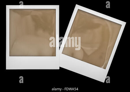 Instant Polaroid-Foto-Rahmen-Isolaten auf schwarzem Hintergrund Stockfoto