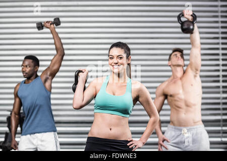 Fit Menschen Hanteln heben Stockfoto