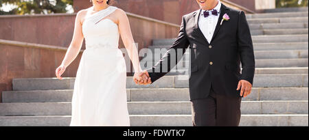 Hochzeitsthema, halten Hände Brautpaar Stockfoto