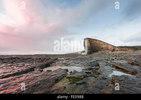 Nash Point mit felsigen Vorder- und Winter Sonnenuntergang Stockfoto