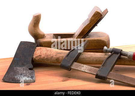 alten benutzten Werkzeuge auf dem Schreibtisch aus Holz Stockfoto