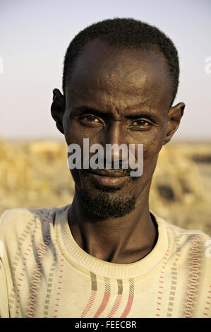 Kopf-Porträt eines Mannes im Dorf Ahmed Ela, Danakil Depression, Afar-Region, Äthiopien Stockfoto