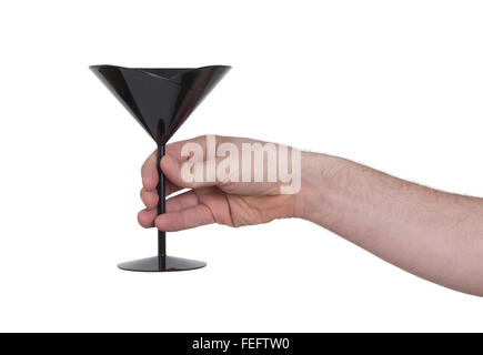 Schwarzer Kunststoff Cocktail Glas in der hand, isoliert auf weiss Stockfoto