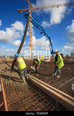 Bauarbeiter Betonieren Stockfoto