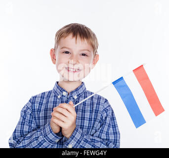 kleiner Junge mit niederländischer Flagge Stockfoto