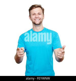 Junge Mann zeigte in die Kamera Lächeln Stockfoto