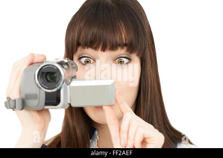 Frau Aufnahme auf tragbare Videokamera Stockfoto