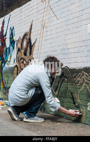 Street-Art in Shoreditch. Urbane Künstler Zeichnung Graffiti an der Wand in Shoreditch. Stockfoto