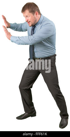 Im mittleren Alter Geschäftsmann ruhte auf ivisible Wand auf weißen Hintergrund isoliert Stockfoto