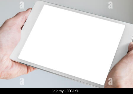 Halten moderne silberne und weiße Tablette in beiden Händen mit isolierten display Stockfoto