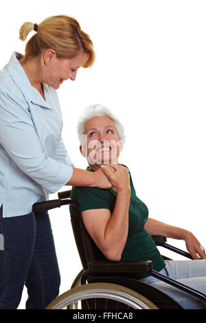 Erweiterte Pflege Krankenschwester Behinderungen senior Frau im Rollstuhl Stockfoto