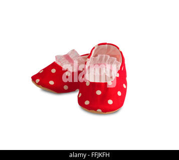 süße rote Babyschuhe isoliert auf weißem Hintergrund Stockfoto