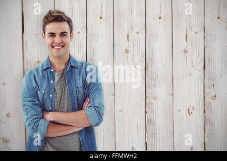 Zusammengesetztes Bild des lächelnden kreative Unternehmer von seinem Schreibtisch Stockfoto